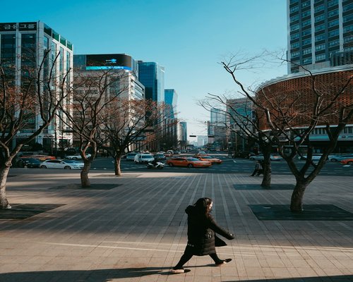 A person taking a relaxing walk in the city